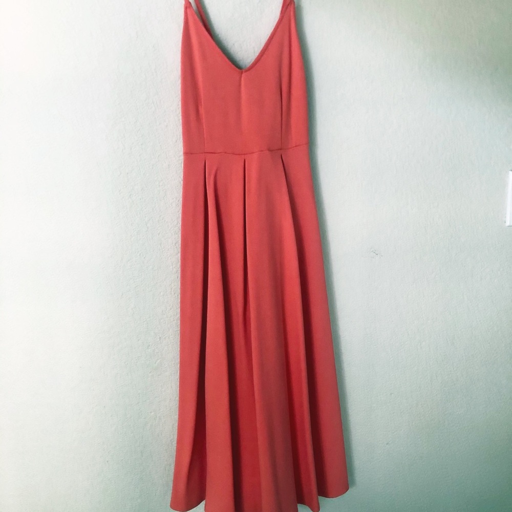 V-neck midi dress. Orange pink tone